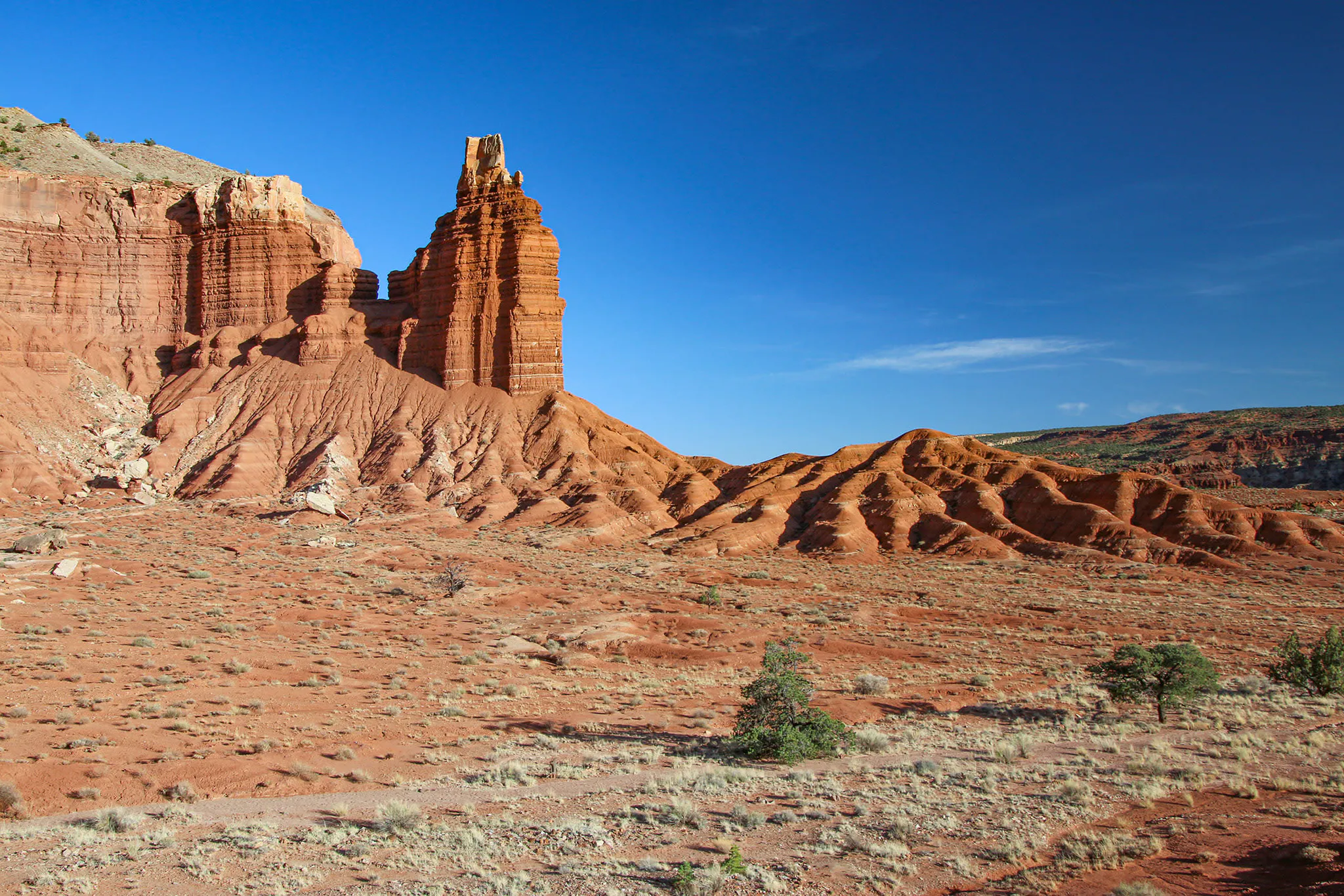 Chimney Rock contrasting against a deep blue sky in Capitol Reef National Park