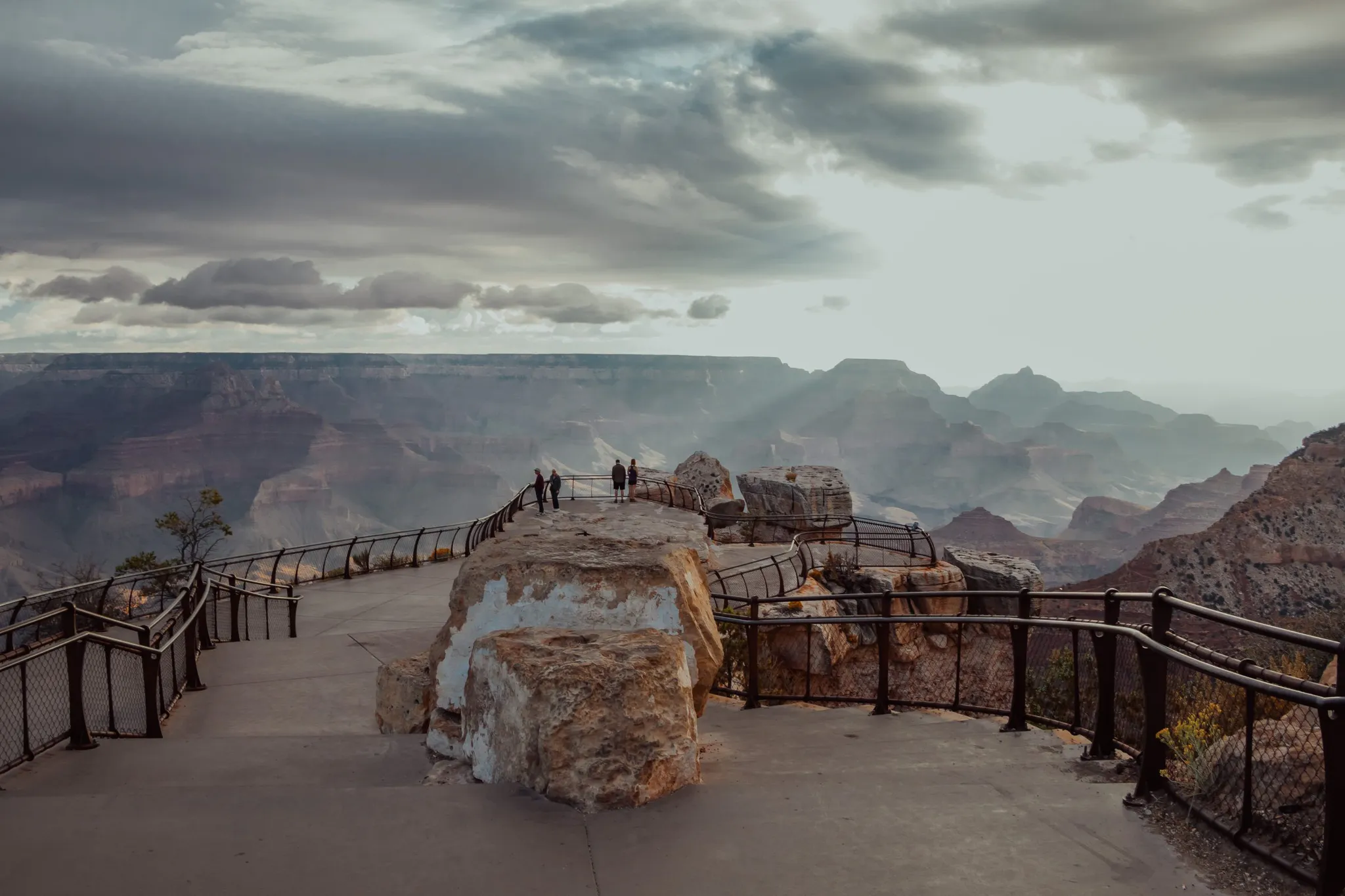People Enjoying The Grand Canyon Viewpoint