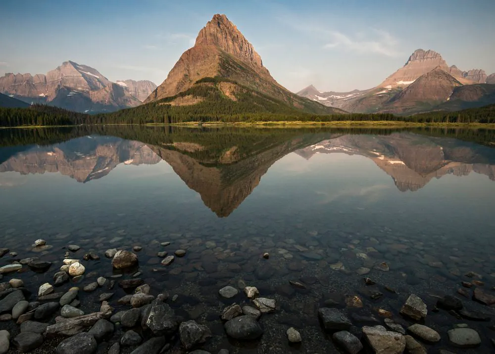 View Of A Mountain Reflected In A Lake At Glacier National Park