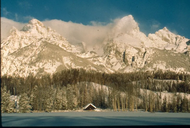 Tetons with Cabin in Winter